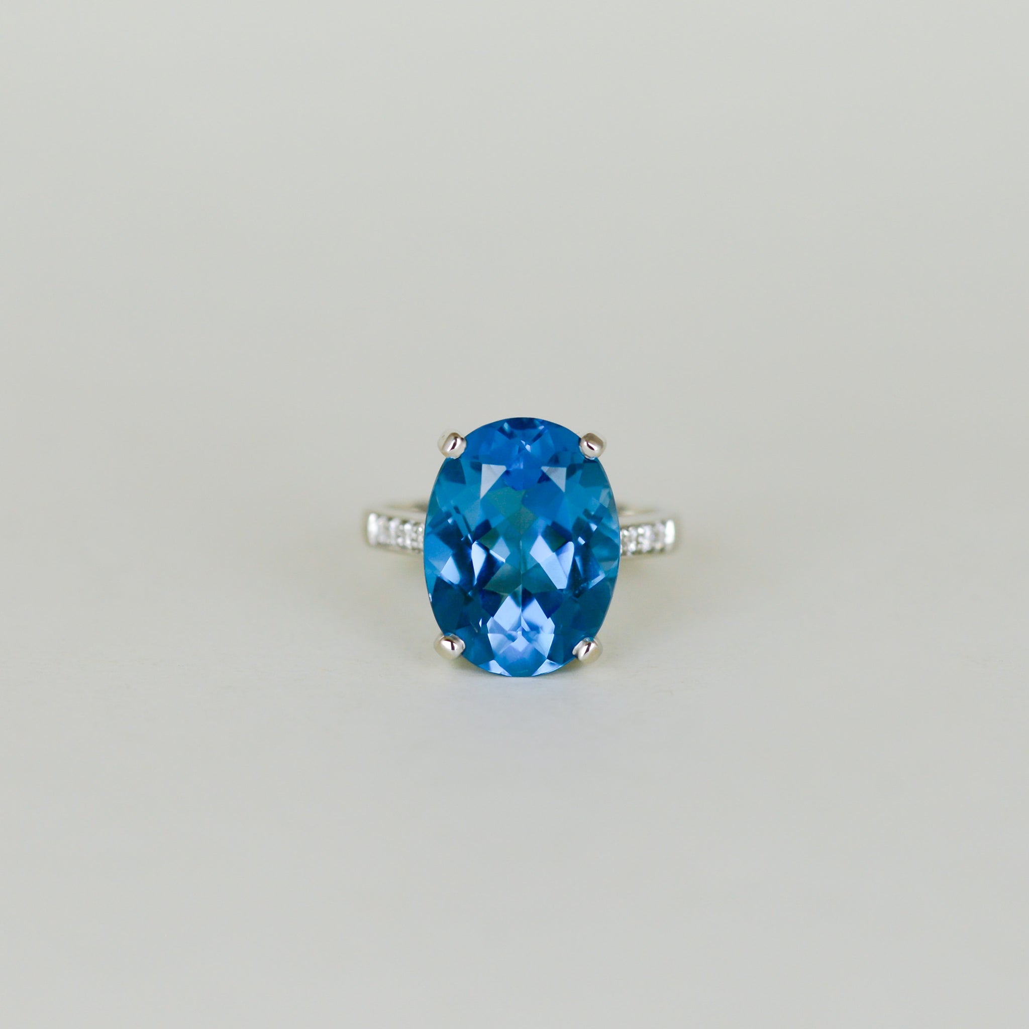9ct White Gold 11.00ct Oval Swiss Blue Topaz and Diamond Dress Ring