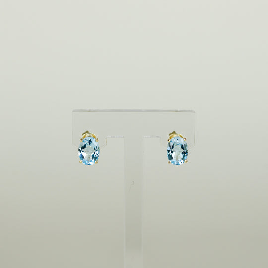 9ct Yellow Gold 2.58ct Oval Blue Topaz Stud Earrings