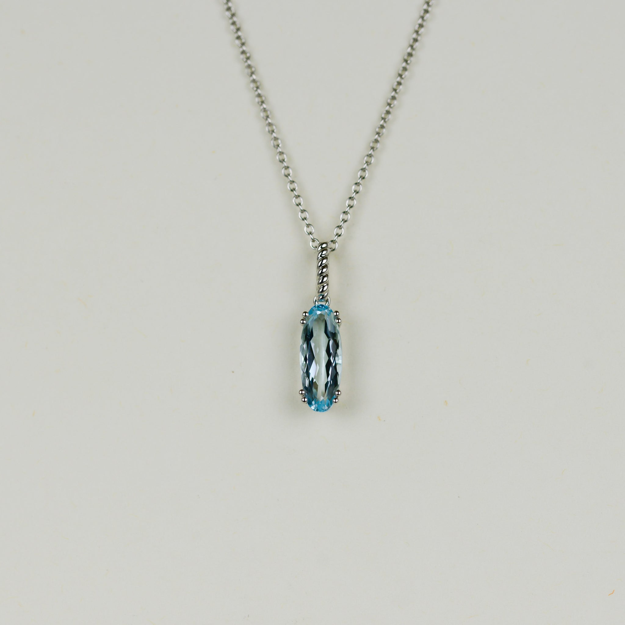9ct White Gold 2.16ct Elongated Oval Blue Topaz Pendant
