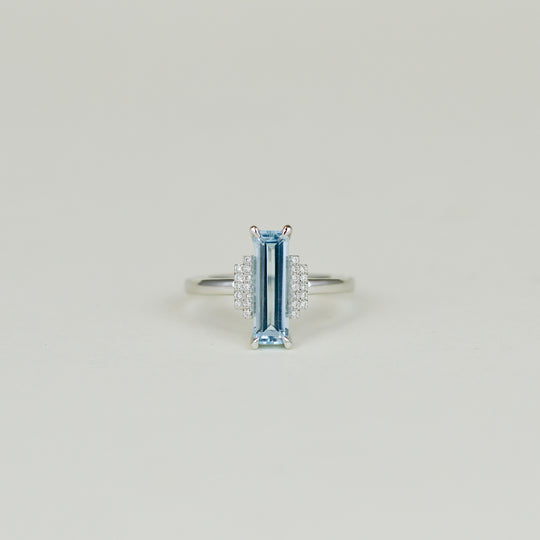 9ct White Gold 1.92ct Elongated Emerald Cut Blue Topaz and Diamond Dress Ring