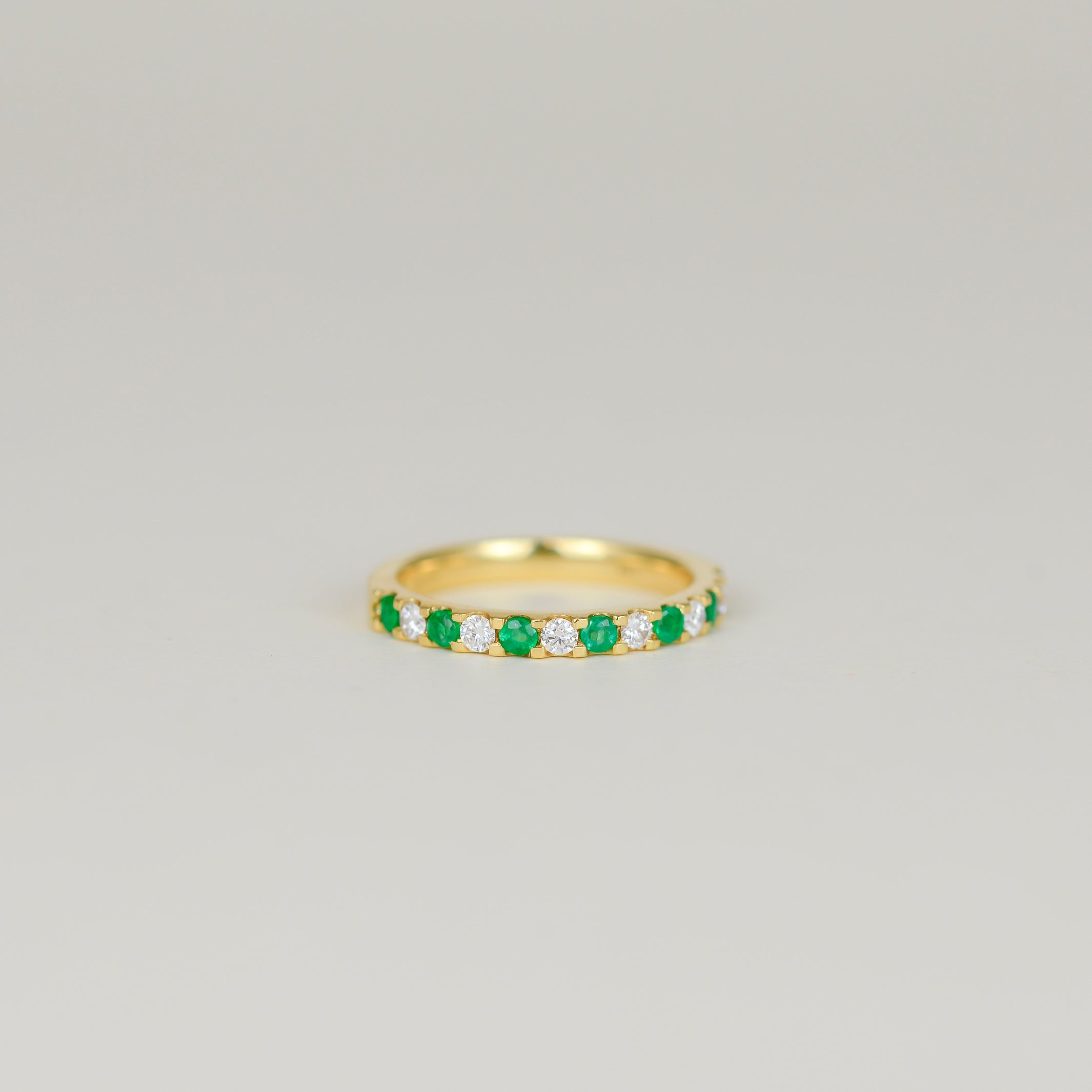 18ct Yellow Gold 0.29ct Castle Set Emerald and Diamond Half Eternity R