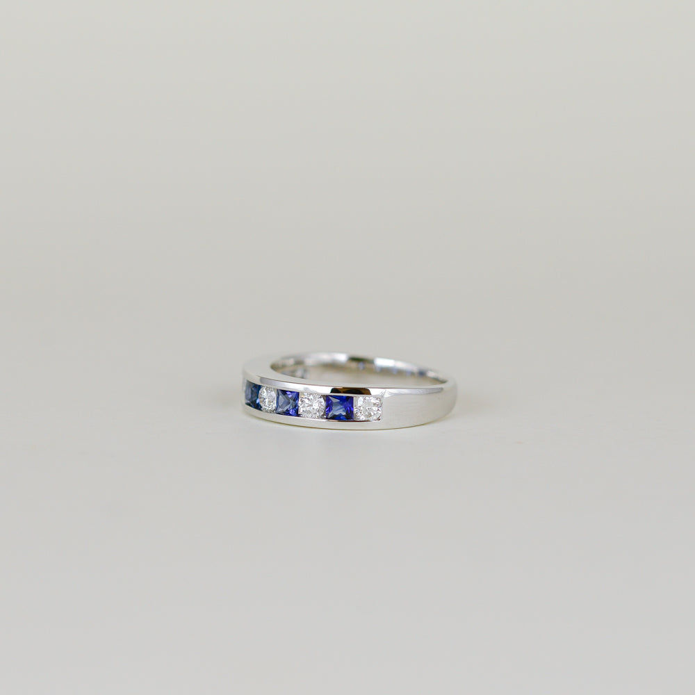 18ct White Gold 0.58ct Round Sapphire and Diamond Channel-Set Half Eternity Ring