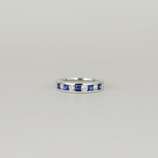 18ct White Gold 0.58ct Round Sapphire and Diamond Channel-Set Half Eternity Ring