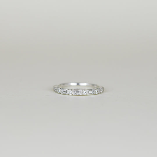Platinum 0.26ct Baguette and Round Brilliant Diamond Eternity Ring
