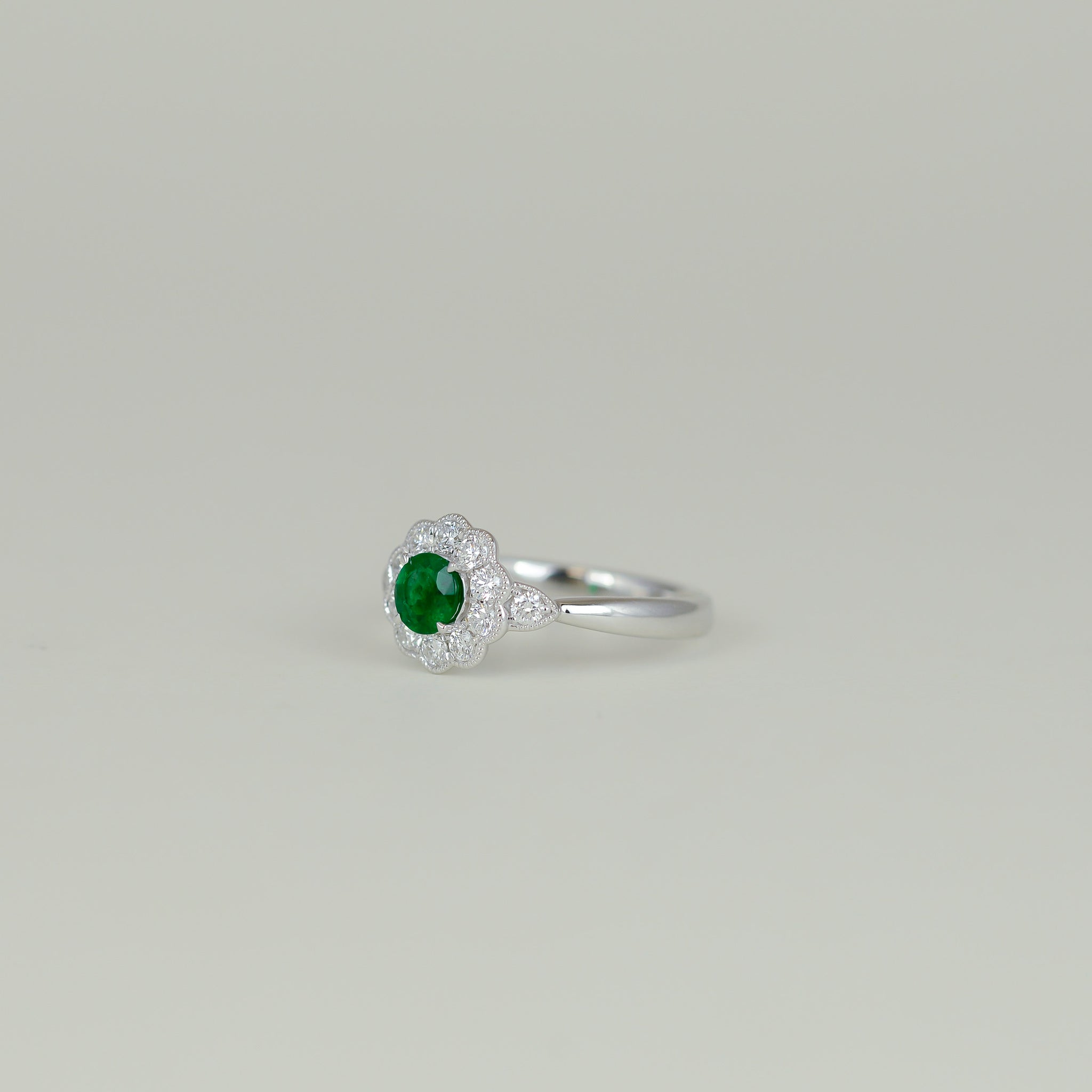 18ct White Gold 0.43ct Emerald and Diamond Cluster Ring