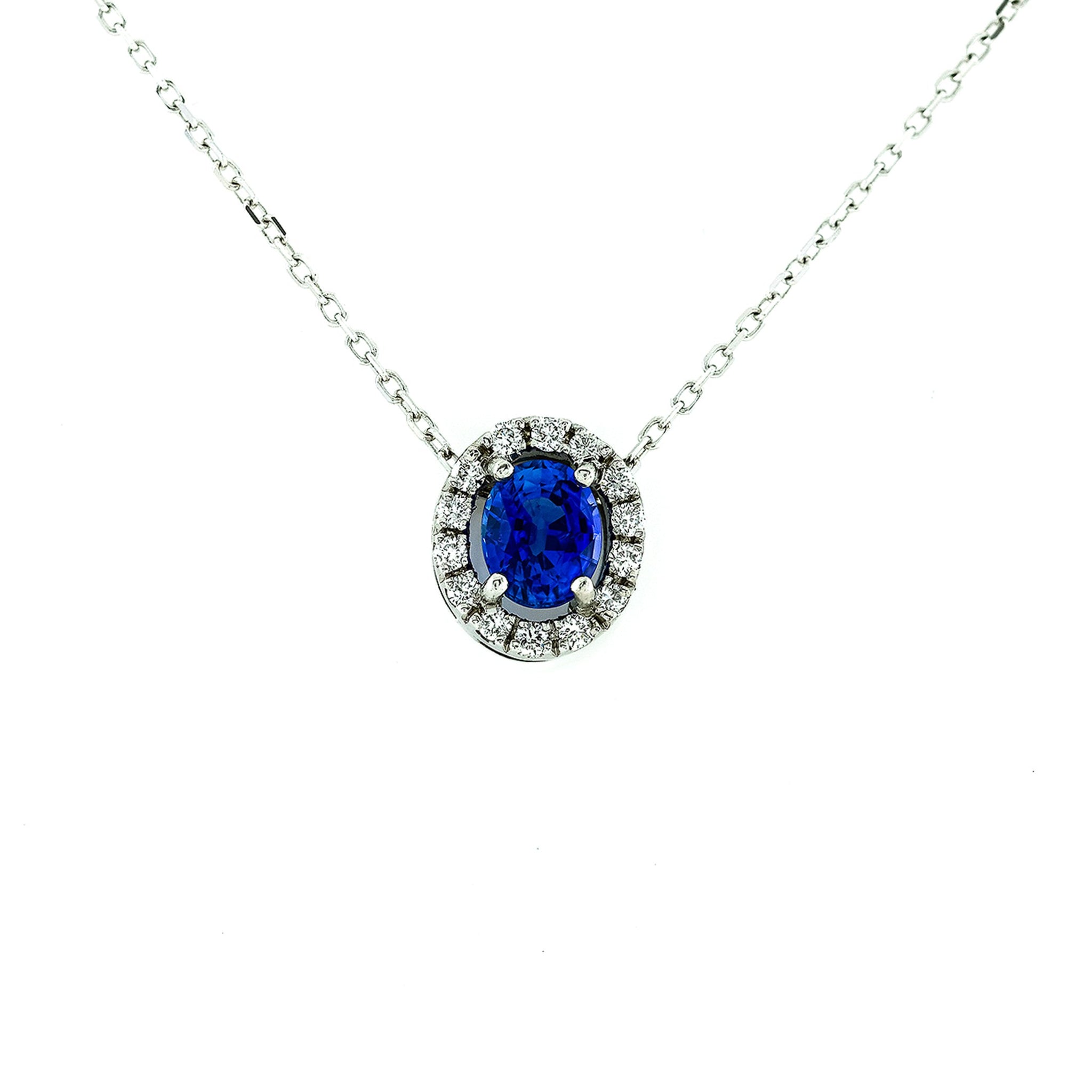 18ct White Gold 0.86ct Sapphire and Diamond Halo Pendant