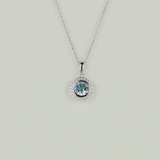 9ct White Gold 0.77ct Round Blue Topaz and Diamond Pendant