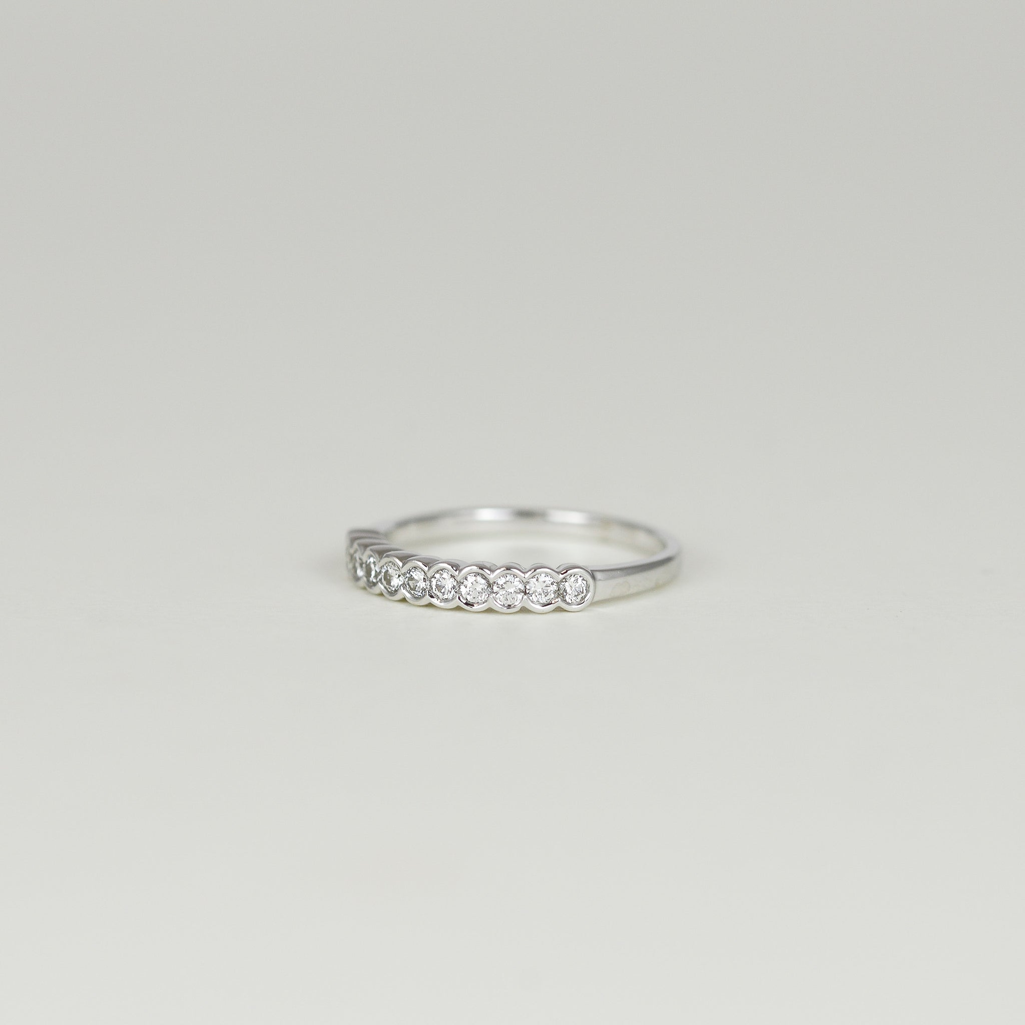 18ct White Gold 0.29ct Rub Set Diamond Half Eternity Ring