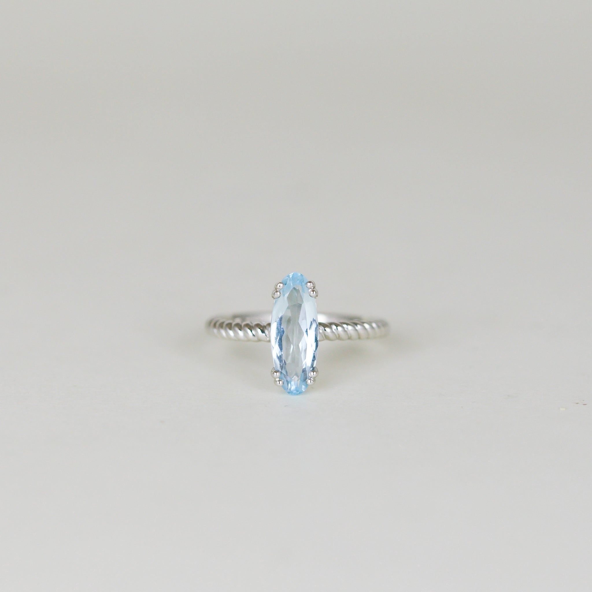 9ct White Gold 1.78ct Elongated Oval Blue Topaz Dress Ring