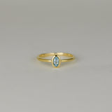 9ct Yellow Gold 0.28ct Rub Set Oval Blue Topaz Ring