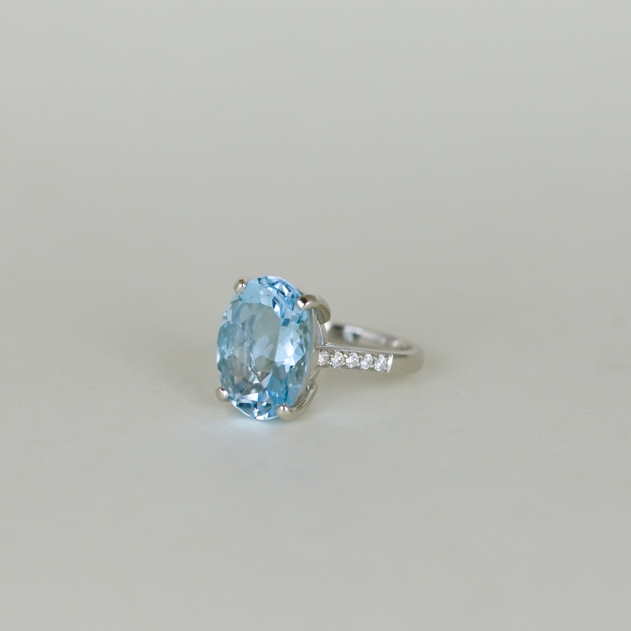 9ct White Gold 11.00ct Oval Blue Topaz and Diamond Dress Ring