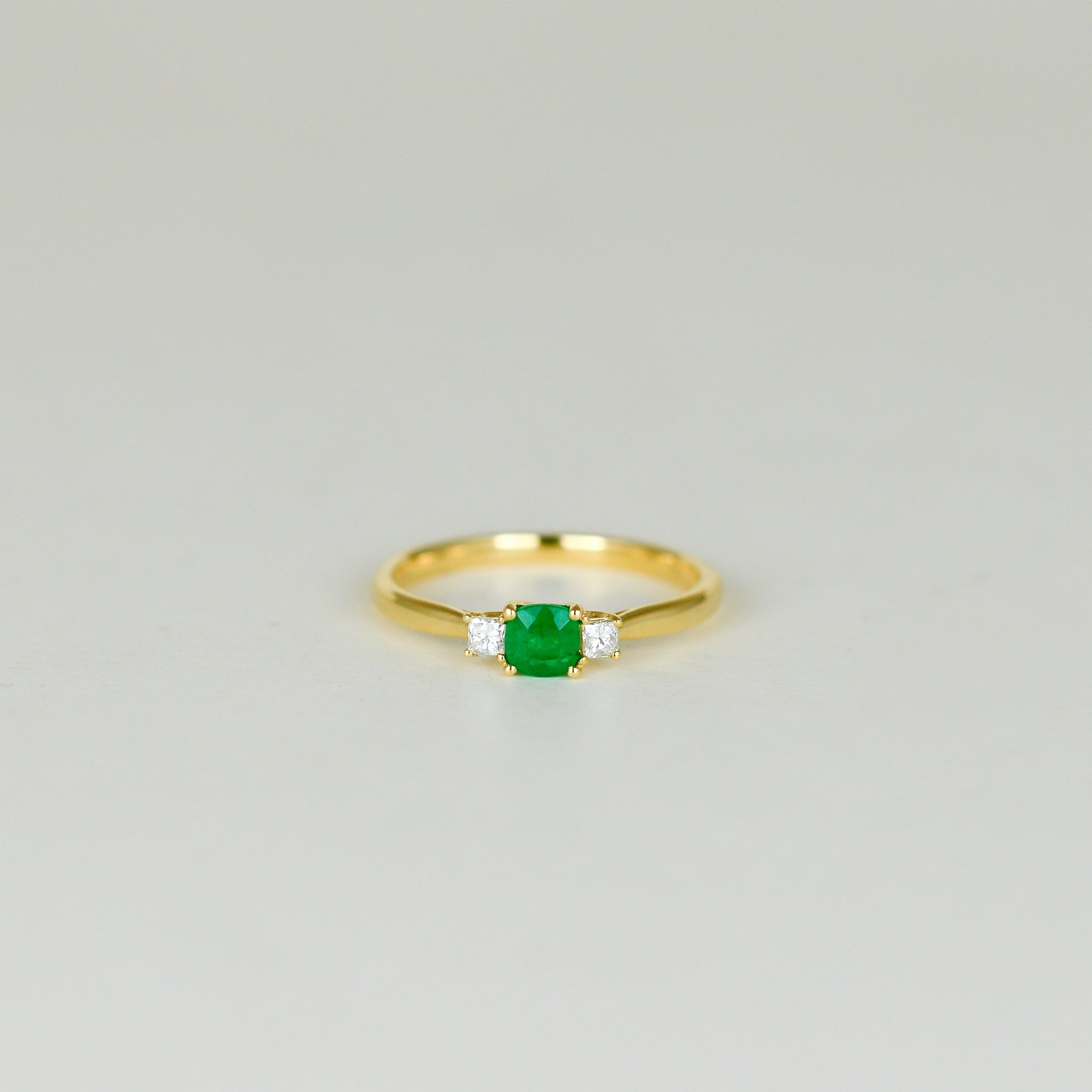 18ct Yellow Gold 0.25ct Cushion Emerald and Diamond Three Stone Ring