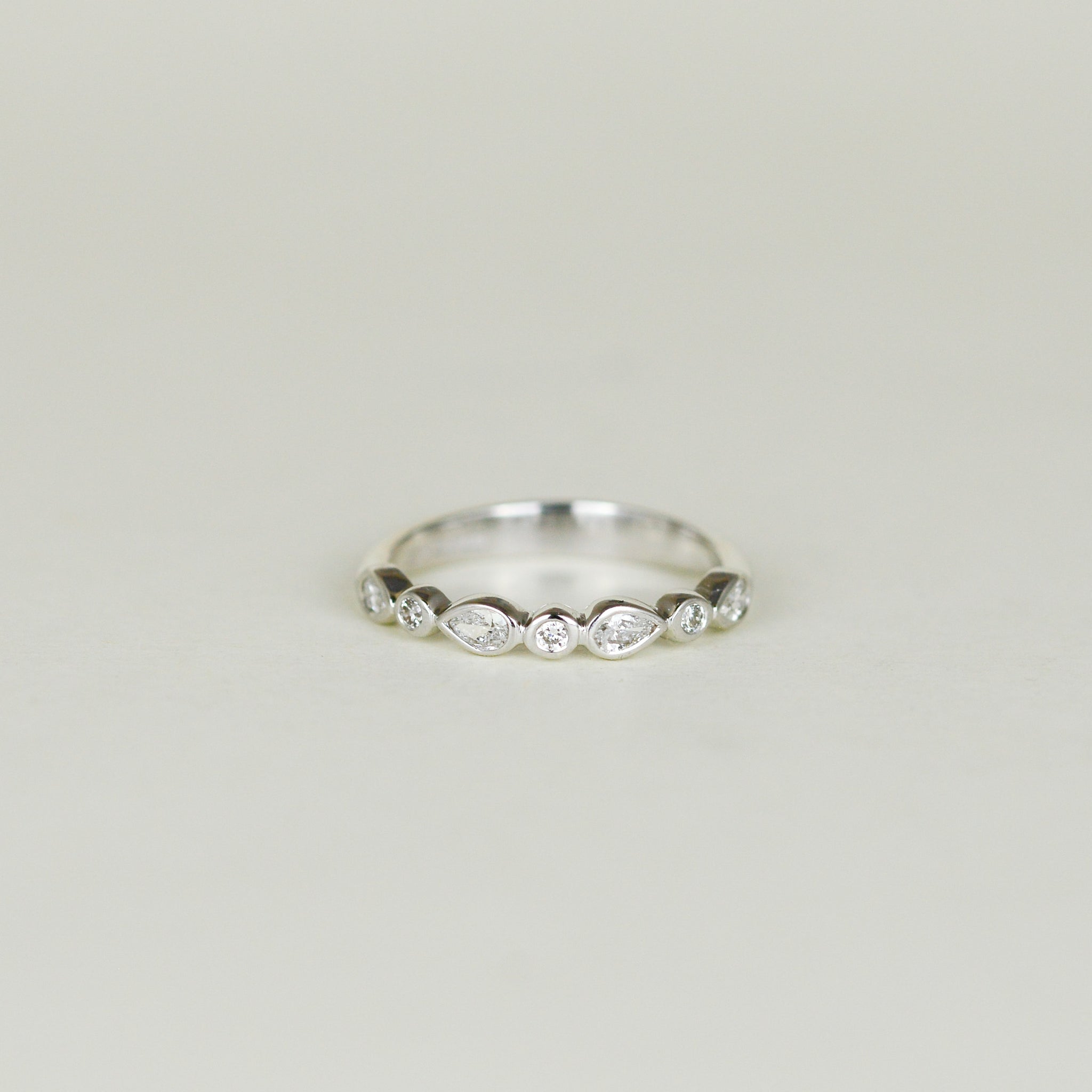 18ct White Gold 0.25ct Pear Cut Diamond Half Eternity Ring