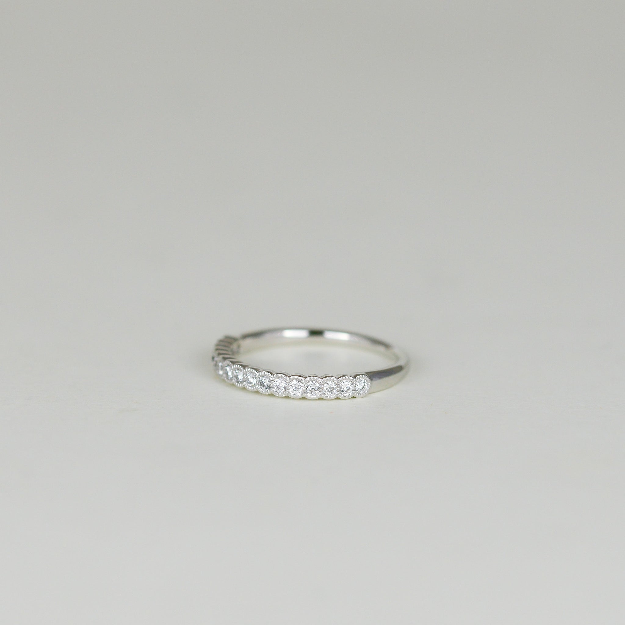 Platinum 0.20ct Round Brilliant Diamond Scalloped Edge Half Eternity Ring