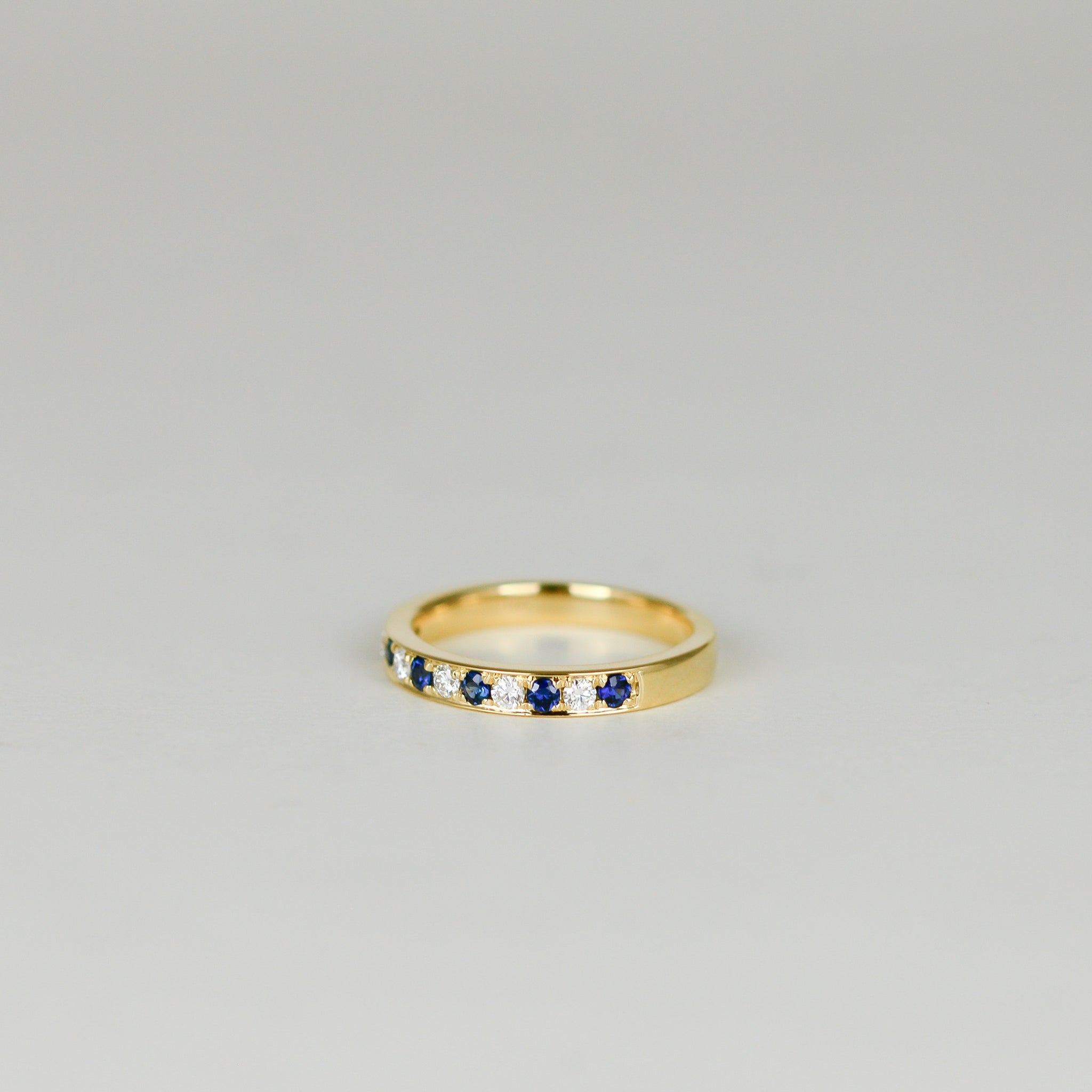 18ct Yellow Gold 0.25ct Round Sapphire and Diamond Half Eternity Ring