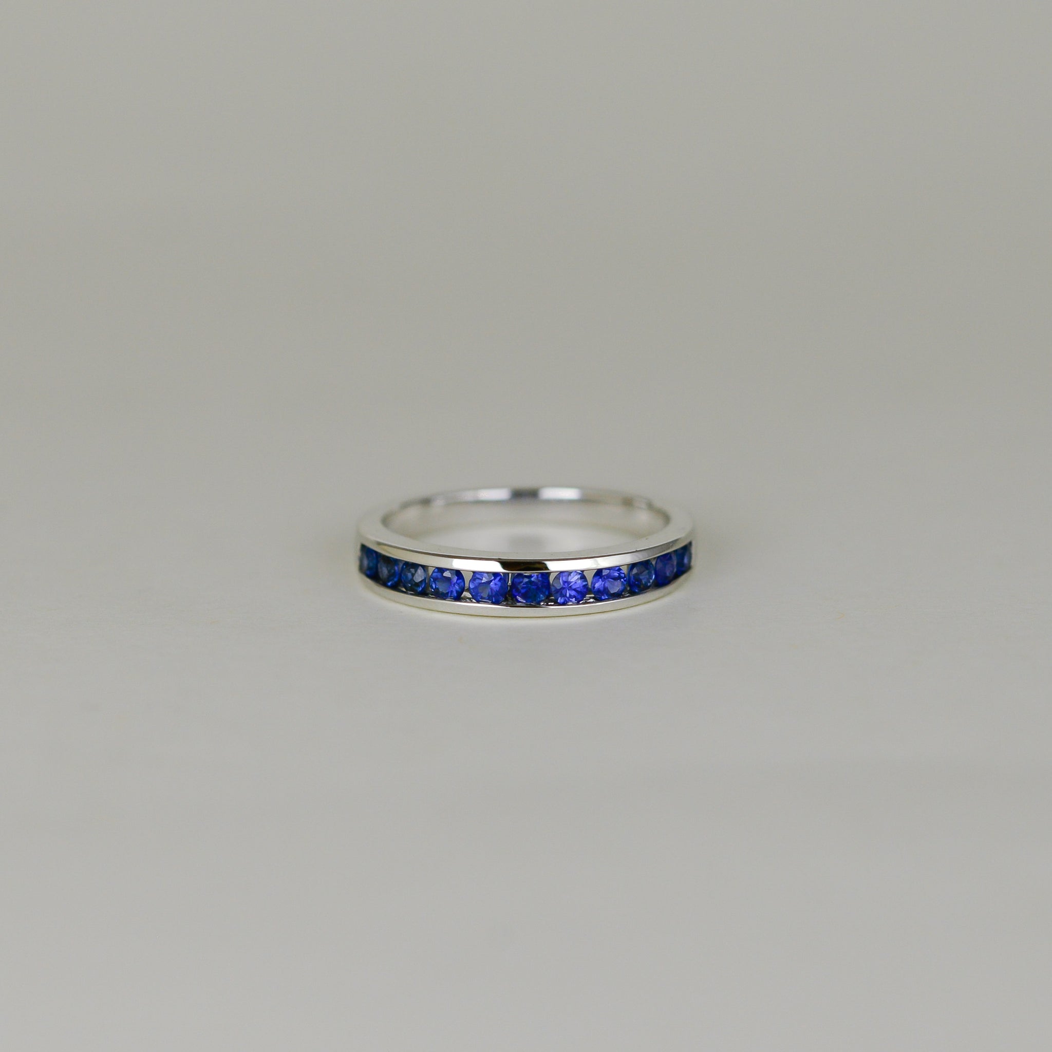 18ct White Gold 0.56ct Round Sapphire Eternity Ring