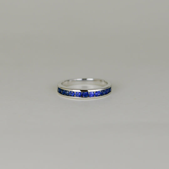 18ct White Gold 0.56ct Round Sapphire Eternity Ring