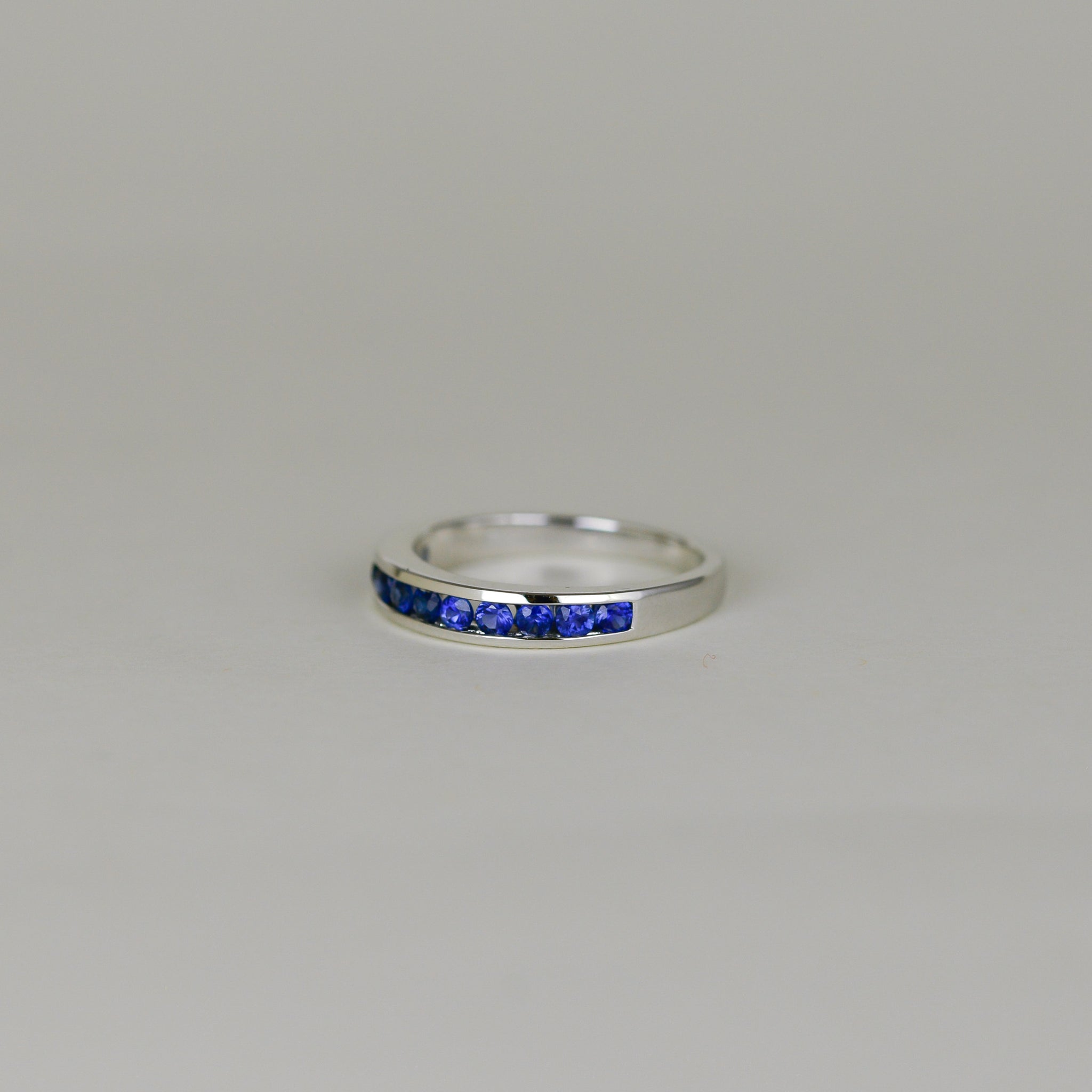 18ct White Gold 0.56ct Round Sapphire Eternity Ring