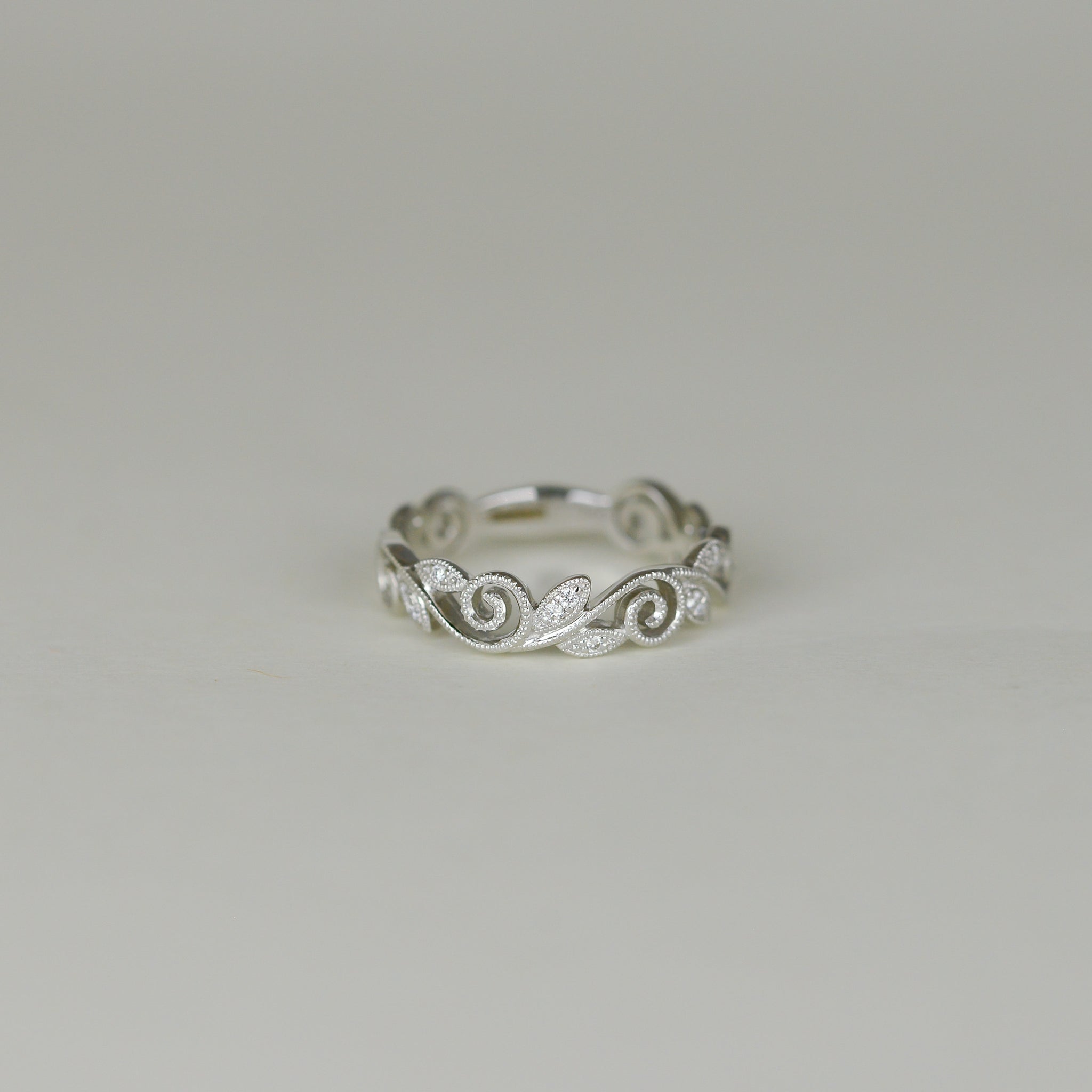 18ct White Gold 0.08ct Scroll & Leaf Eternity Ring