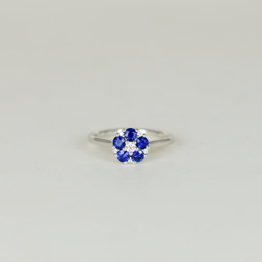 Platinum 0.73ct Round Sapphire and Diamond Daisy Style Cluster Ring Front
