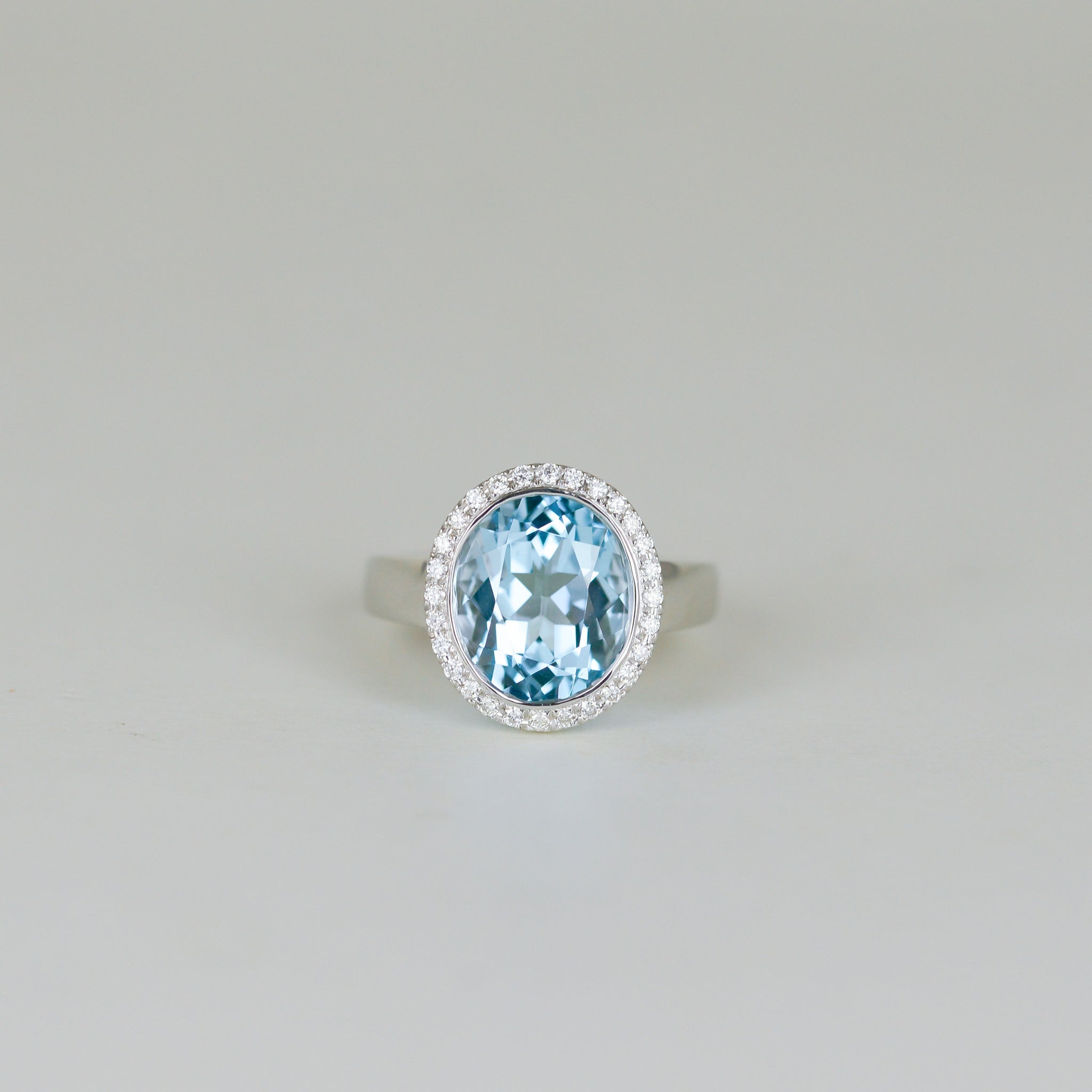 9ct White Gold 6.49ct Oval Blue Topaz and Diamond Dress Ring