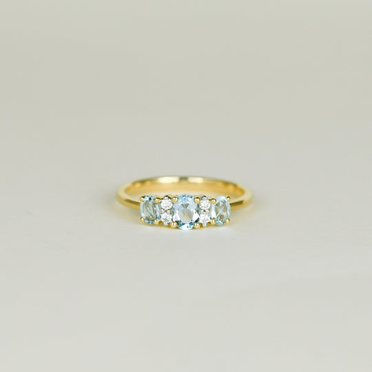 9ct Yellow Gold 0.80ct Oval Blue Topaz and Diamond Three Stone Dress Ring