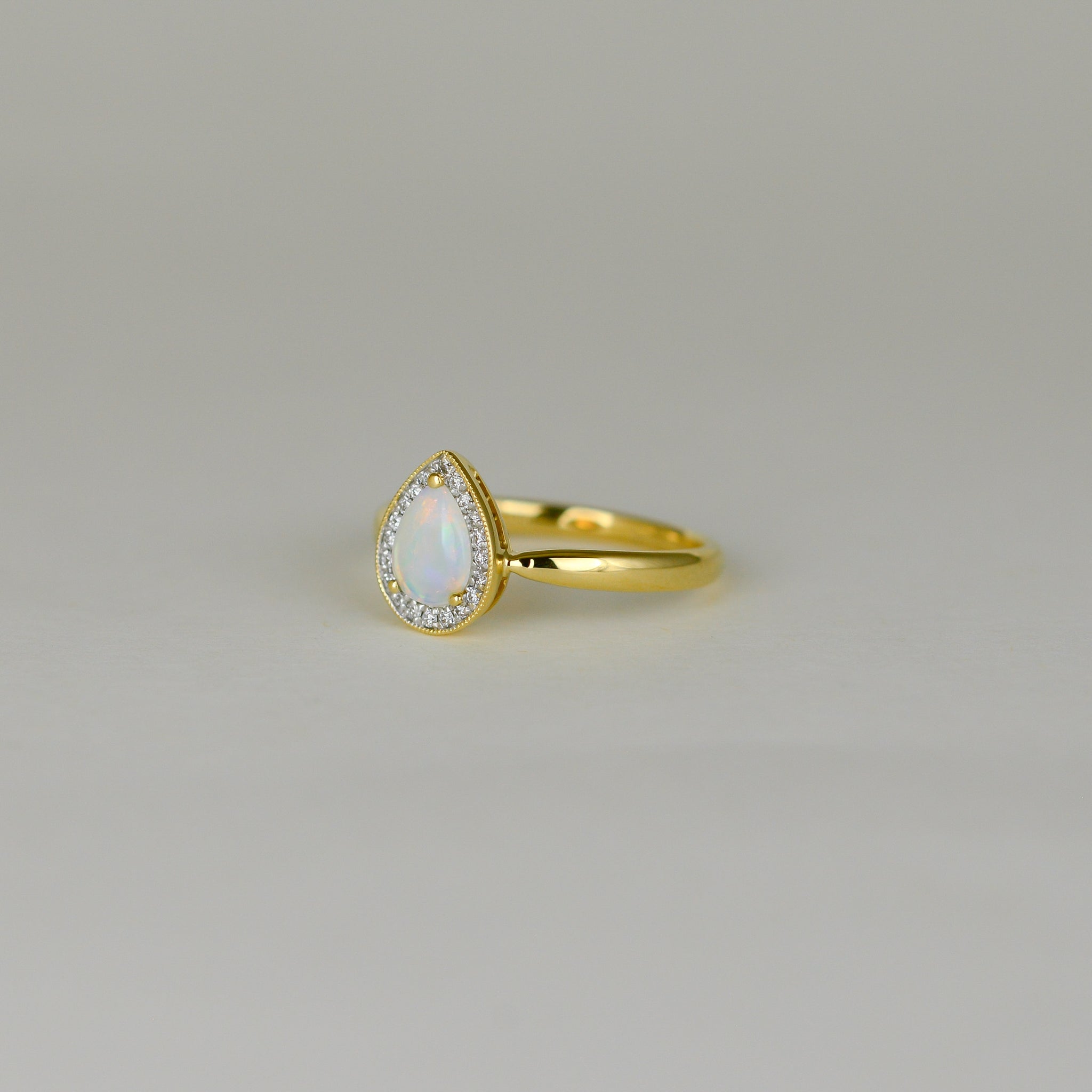 18ct Yellow Gold 0.34ct Pear Opal and Diamond Dress Ring