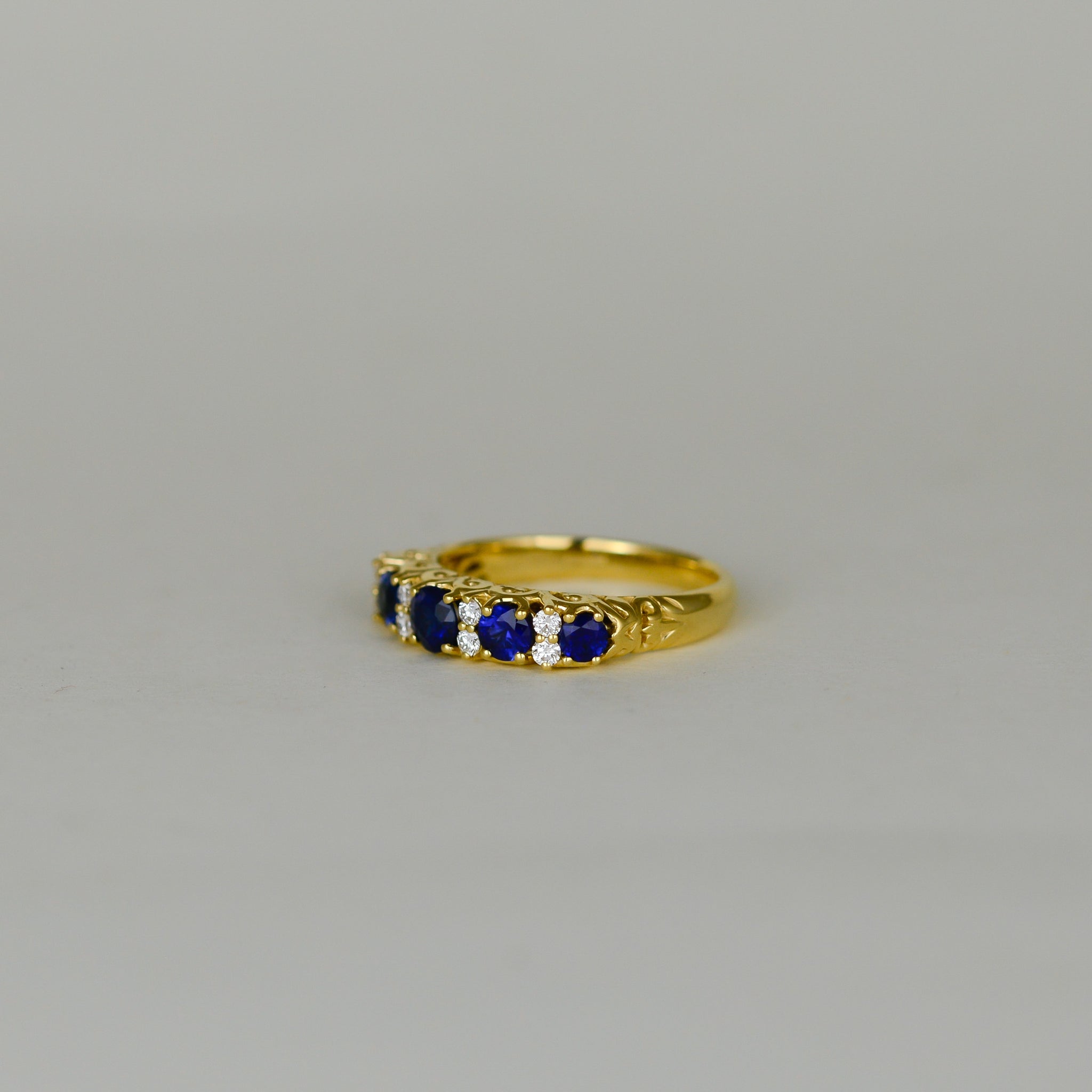 18ct Yellow Gold 0.94ct Round Sapphire and Diamond Dress Ring