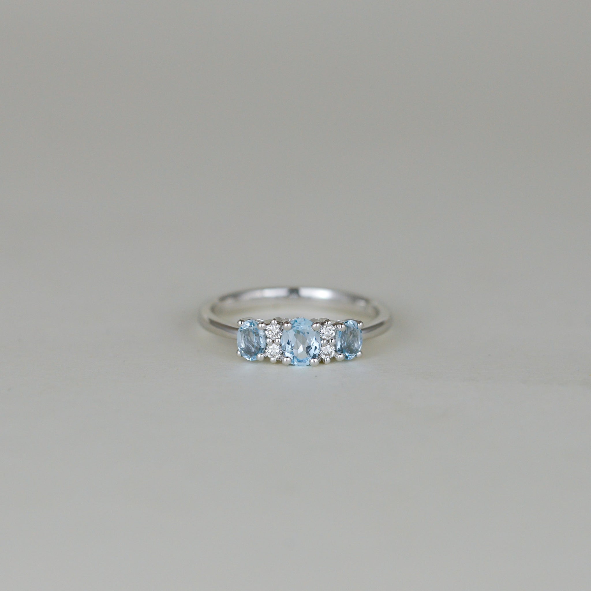 9ct White Gold 0.81ct Oval Blue Topaz and Diamond Dress Ring