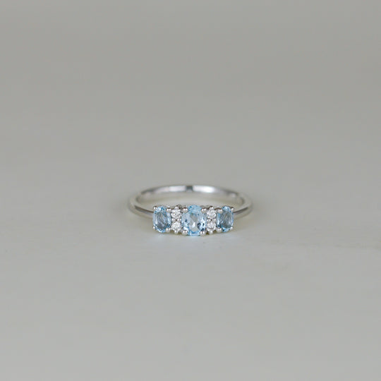 9ct White Gold 0.81ct Oval Blue Topaz and Diamond Dress Ring