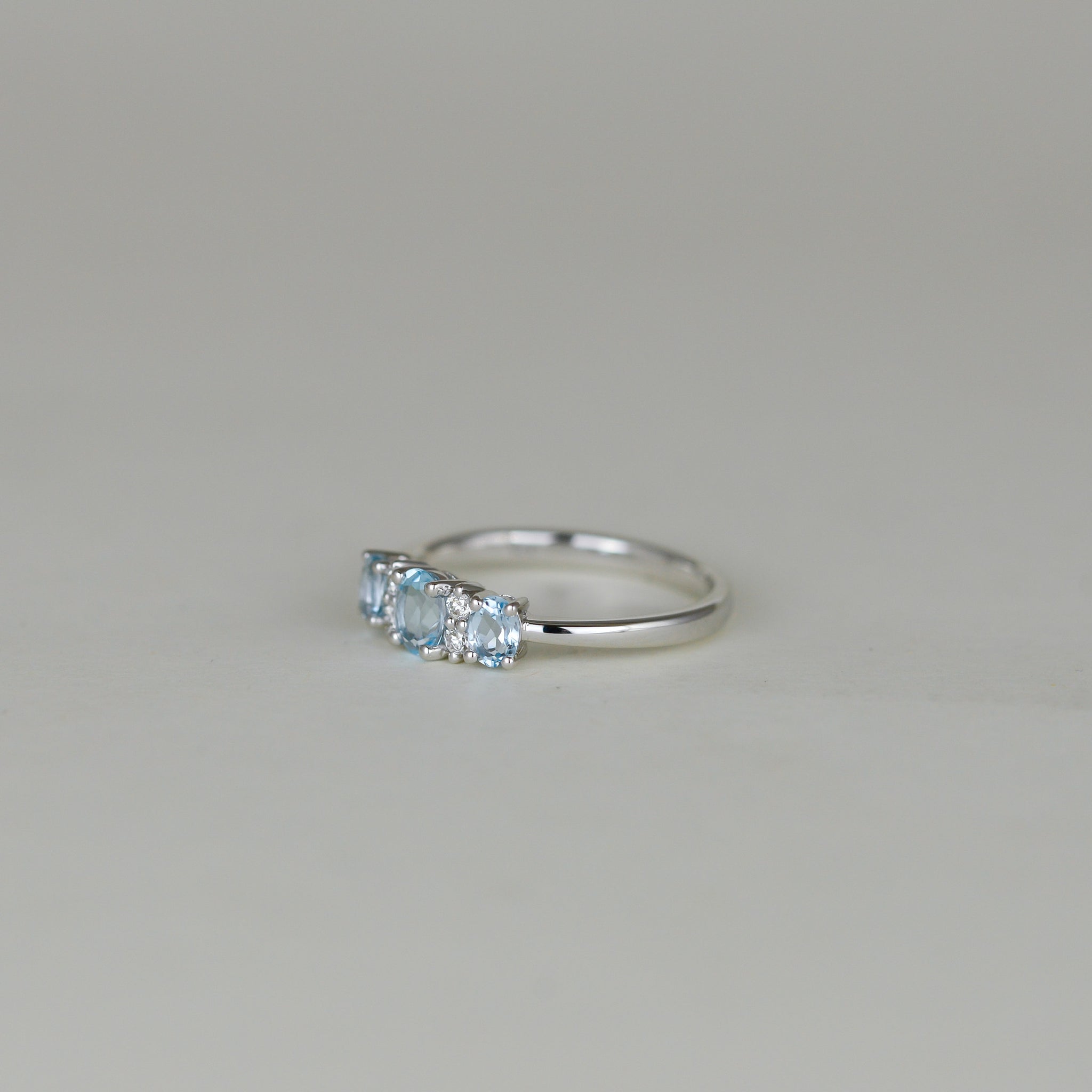 9ct White Gold 0.81ct Oval Blue Topaz and Diamond Dress Ring