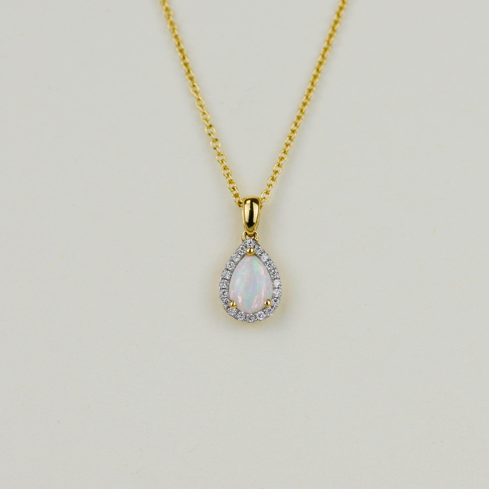 18ct Yellow Gold 0.32ct Pear Cut Opal and Diamond Pendant