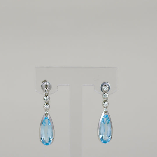 9ct White Gold 4.00ct Oval Blue Topaz and Diamond Drop Earrings