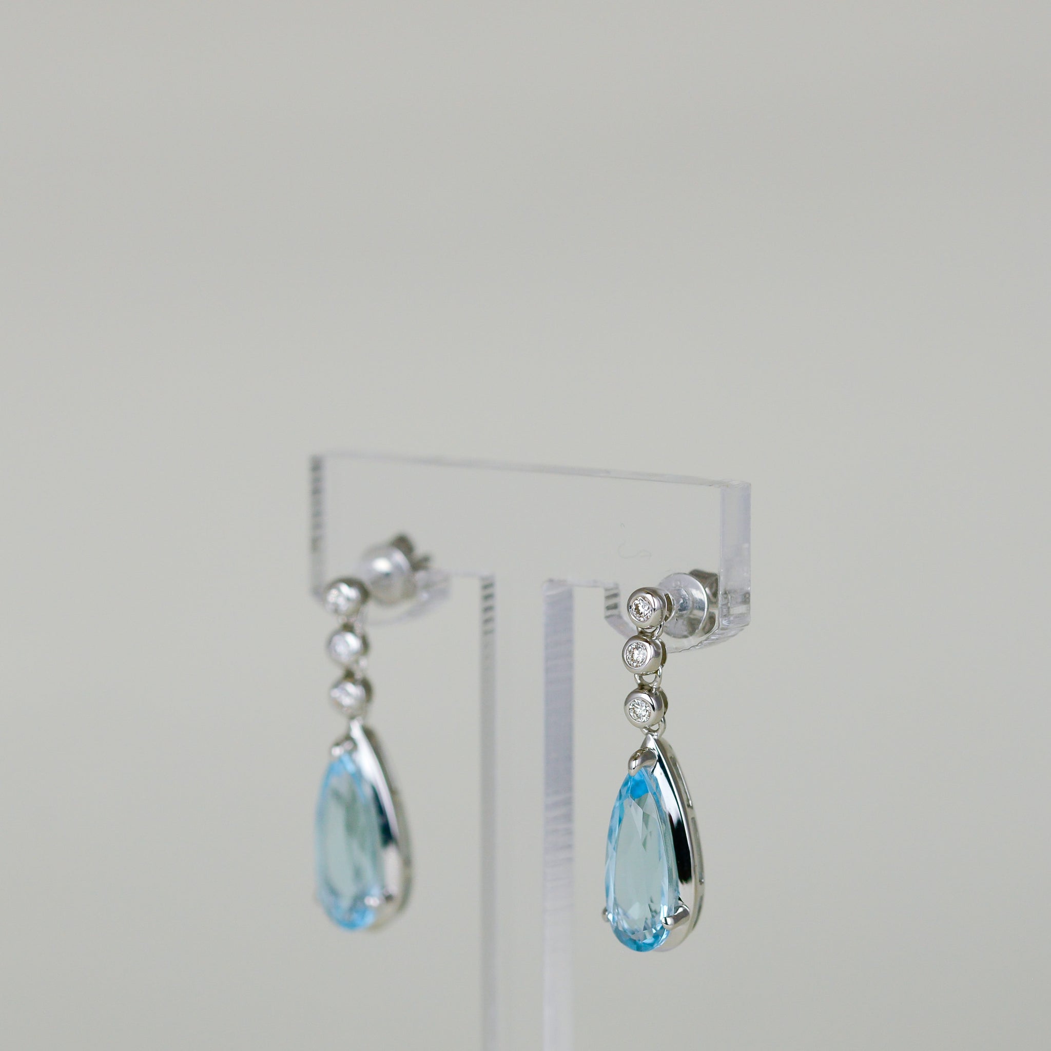 9ct White Gold 4.00ct Oval Blue Topaz and Diamond Drop Earrings