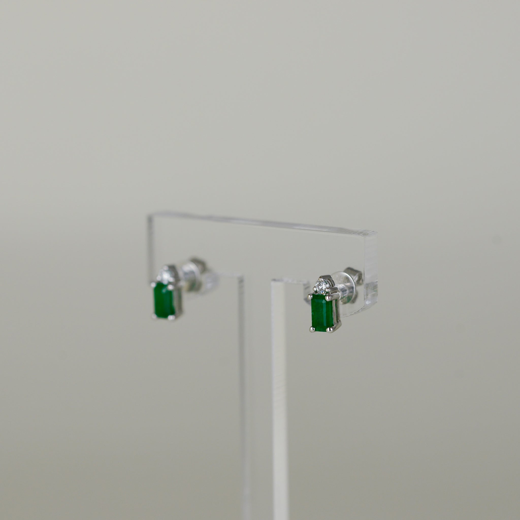 18ct White Gold 0.61ct Emerald Cut Emerald and Diamond Stud Earrings