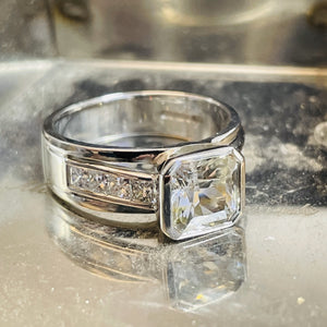 <br><h3>
A chunky engagement ring</h3><br>
With channel set diamonds along the band.