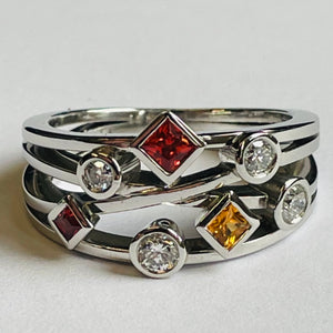<br><h3>Geometric scattered gemstone ring</h3><br>
Warm toned gemstones and cool toned metal make this ring a winner
