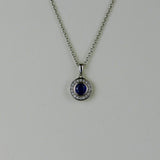 18ct White Gold 0.31ct Sapphire and Diamond Halo Pendant