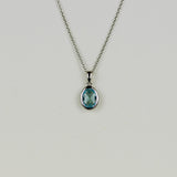 9ct White Gold 1.40ct Checkerboard Oval Blue Topaz Pendant