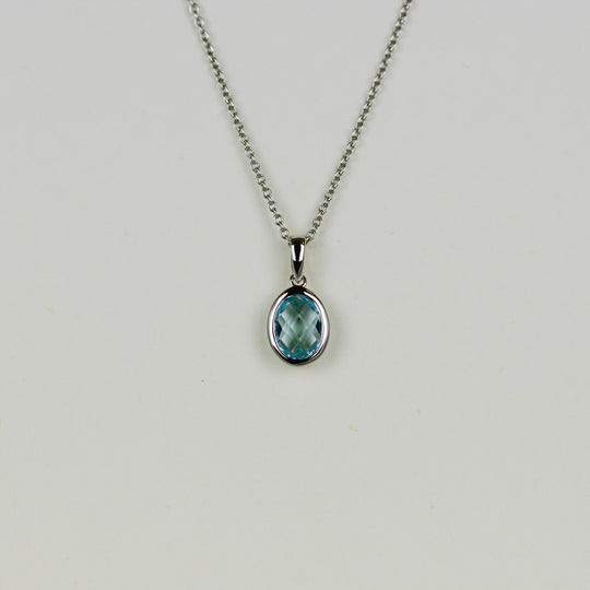 9ct White Gold 1.40ct Checkerboard Oval Blue Topaz Pendant