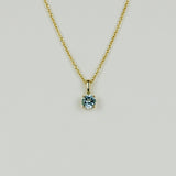 9ct Yellow Gold 0.63ct Round Blue Topaz Pendant