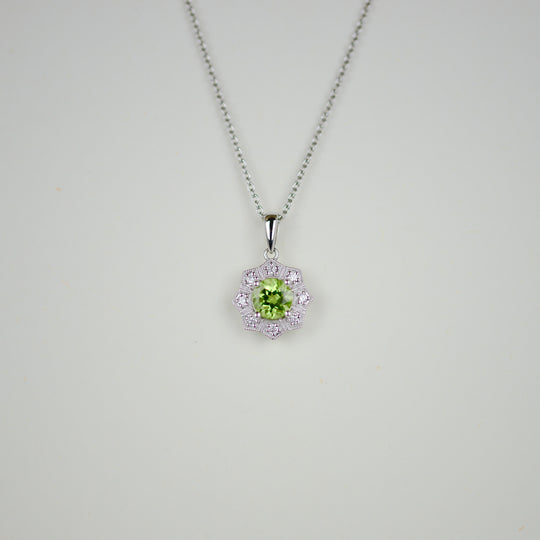 9ct White Gold 0.89ct Round Peridot and Diamond Pendant