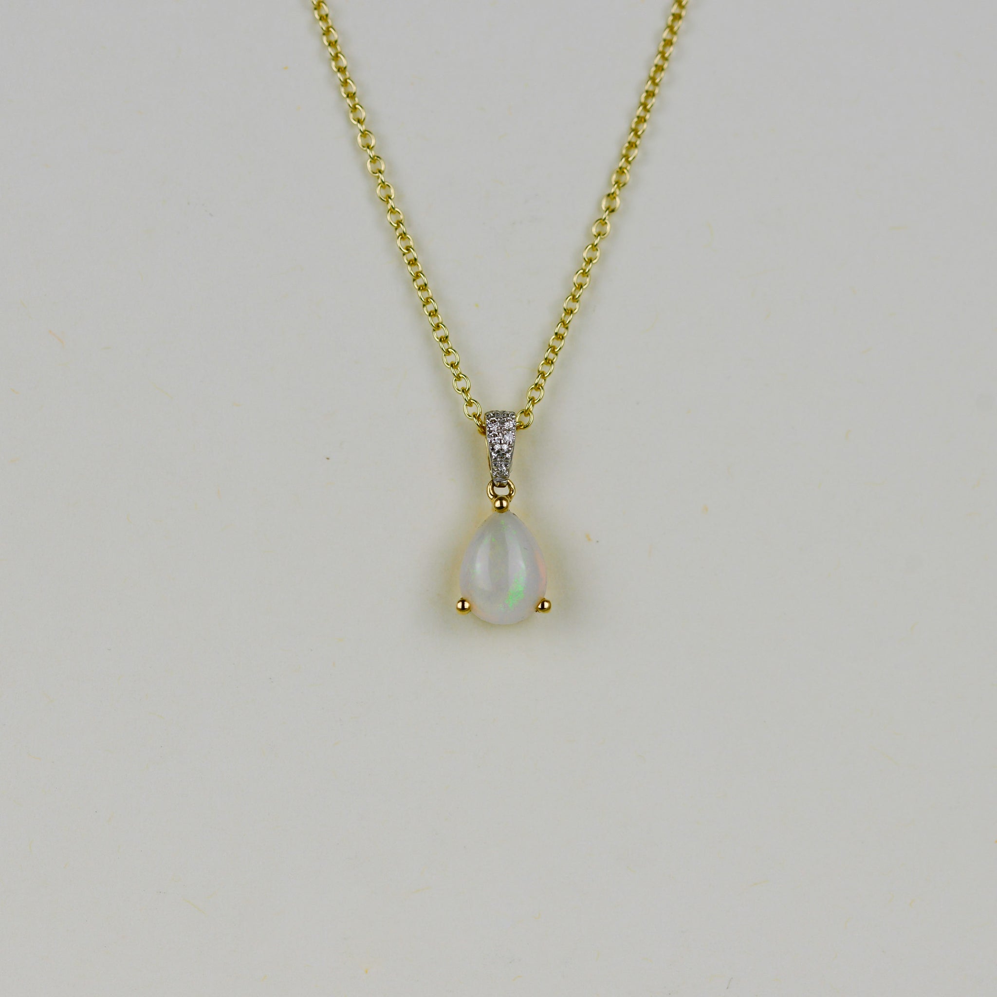 9ct Yellow Gold 0.69ct Pear Opal and Diamond Pendant