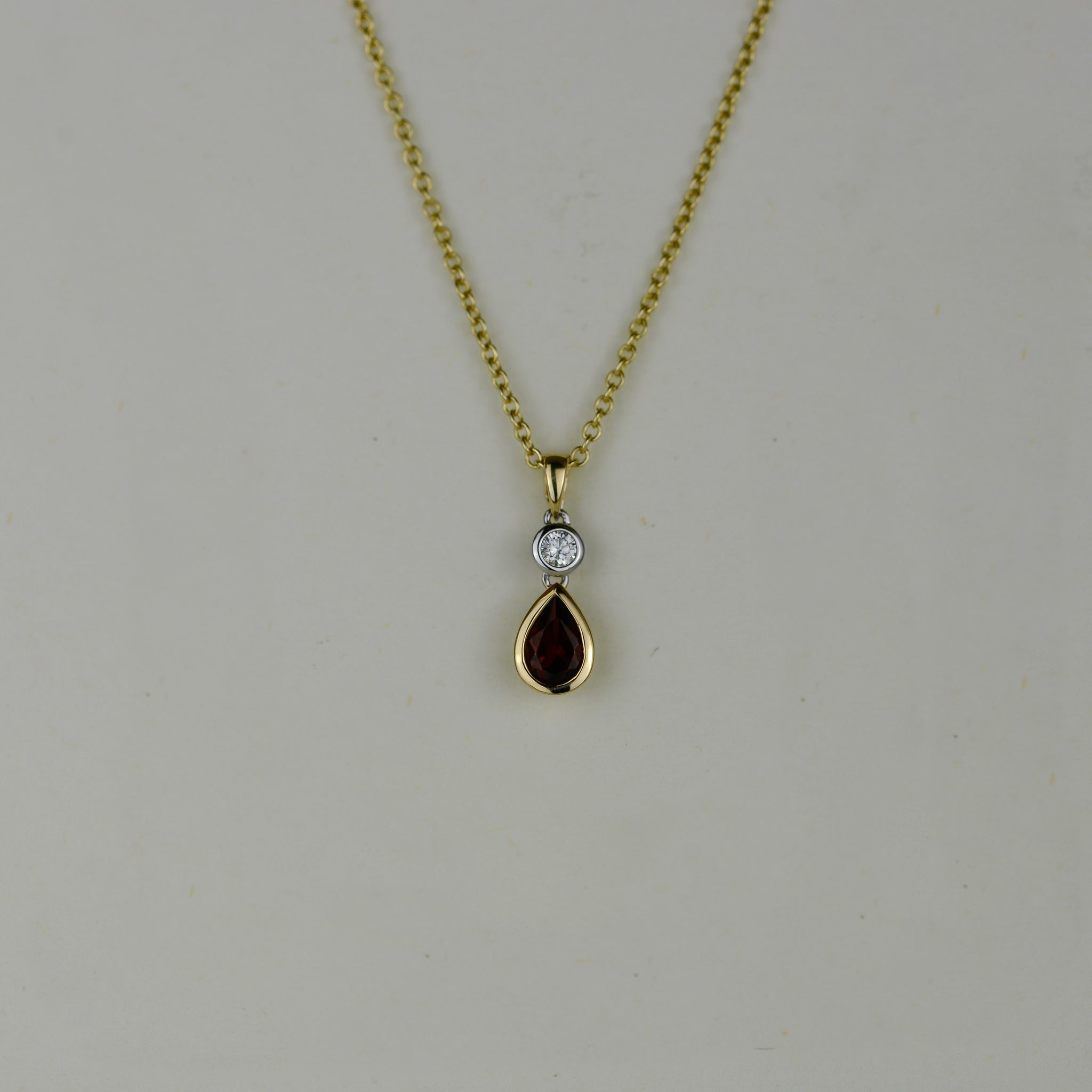 9ct Yellow & White Gold 0.48ct Pear Garnet and Diamond Pendant
