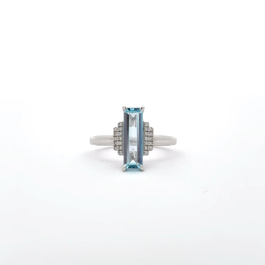 9ct White Gold 1.58ct Elongated Emerald Cut Blue Topaz and Diamond Dress Ring