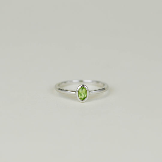 9ct White Gold 0.26ct Oval Rub Set Peridot Ring