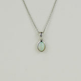 9ct White Gold 0.45ct Rub Set Oval Opal Pendant