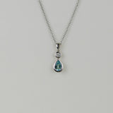 9ct White Gold 0.50ct Pear Blue Topaz and Diamond Drop Pendant