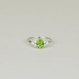 9ct White Gold 0.83ct Oval Peridot and Diamond Cluster Ring