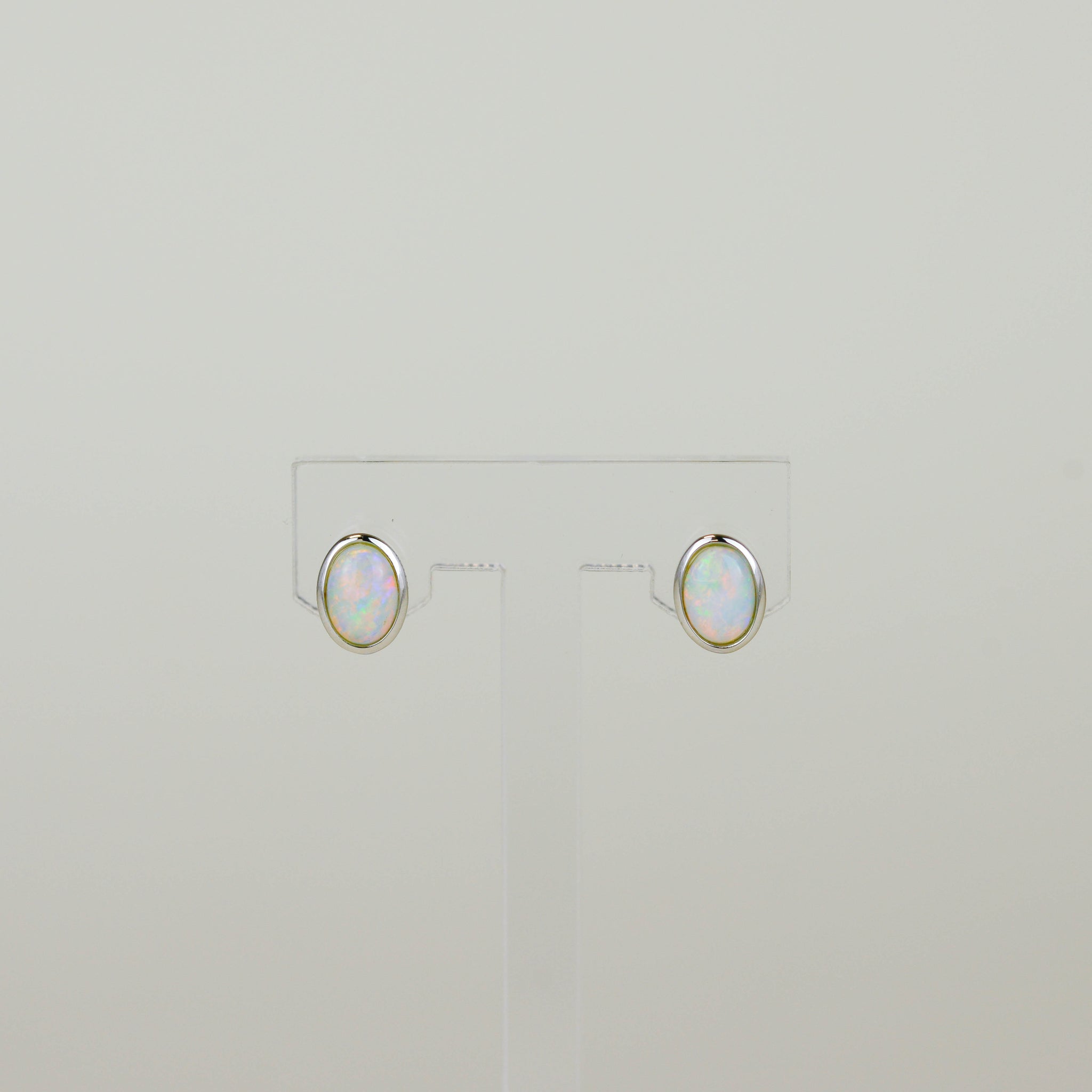 9ct White Gold 0.96ct Rub Set Oval Opal Stud Earrings